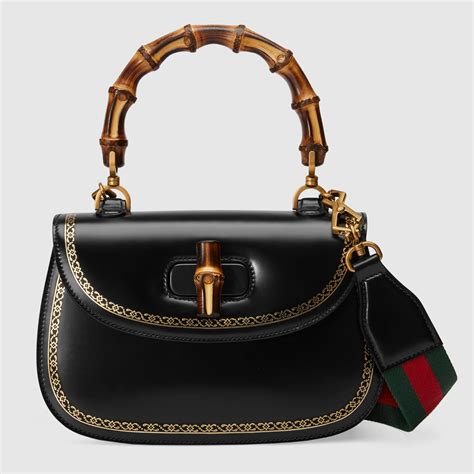 gucci first suitcase with bamboo handle|Gucci bamboo handle bag vintage.